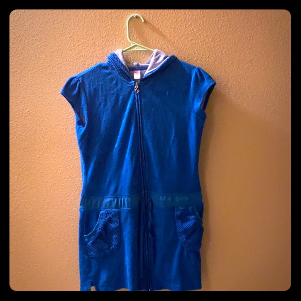 This is a blue bathing suit cover from Justice.